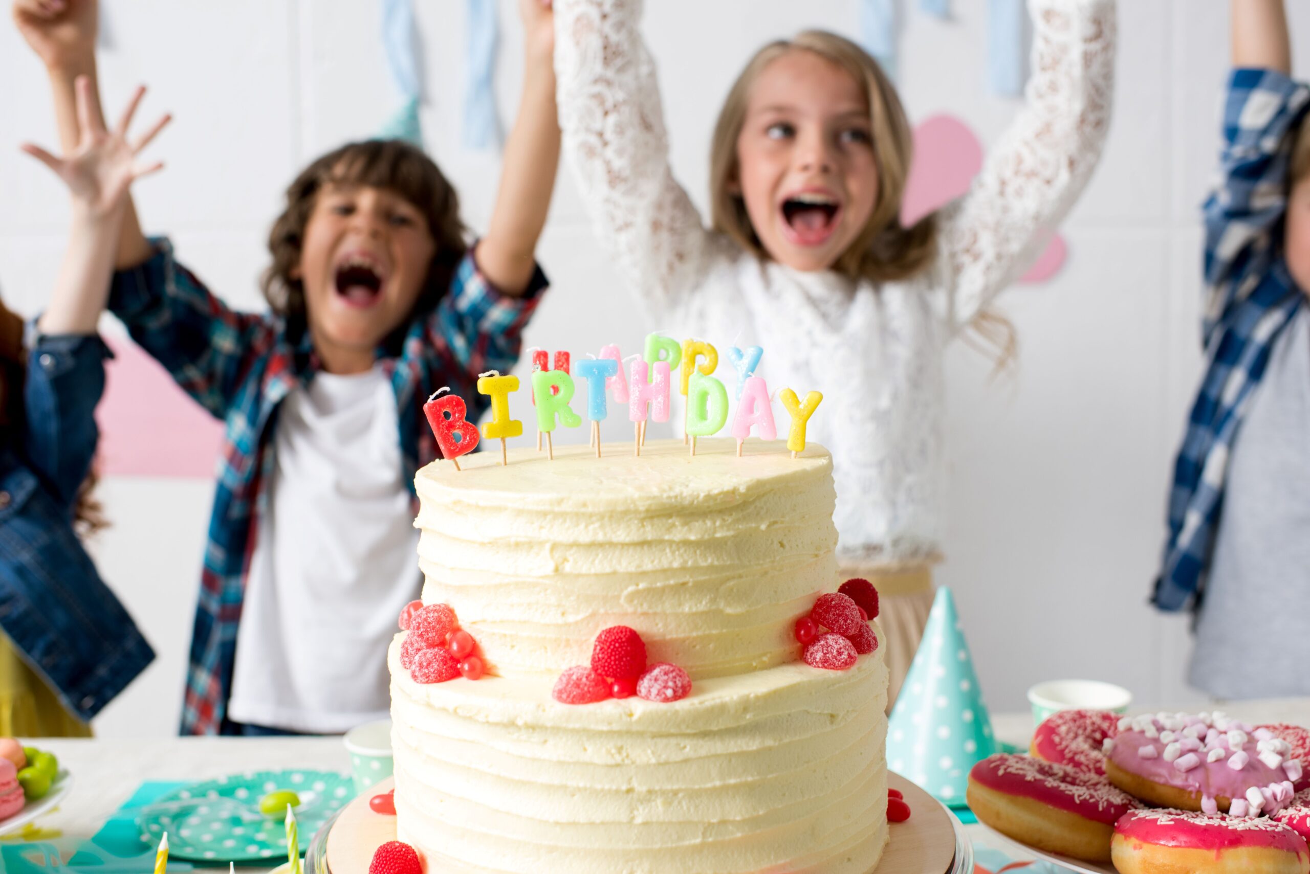 Kids celebrate with cake at Birthday party